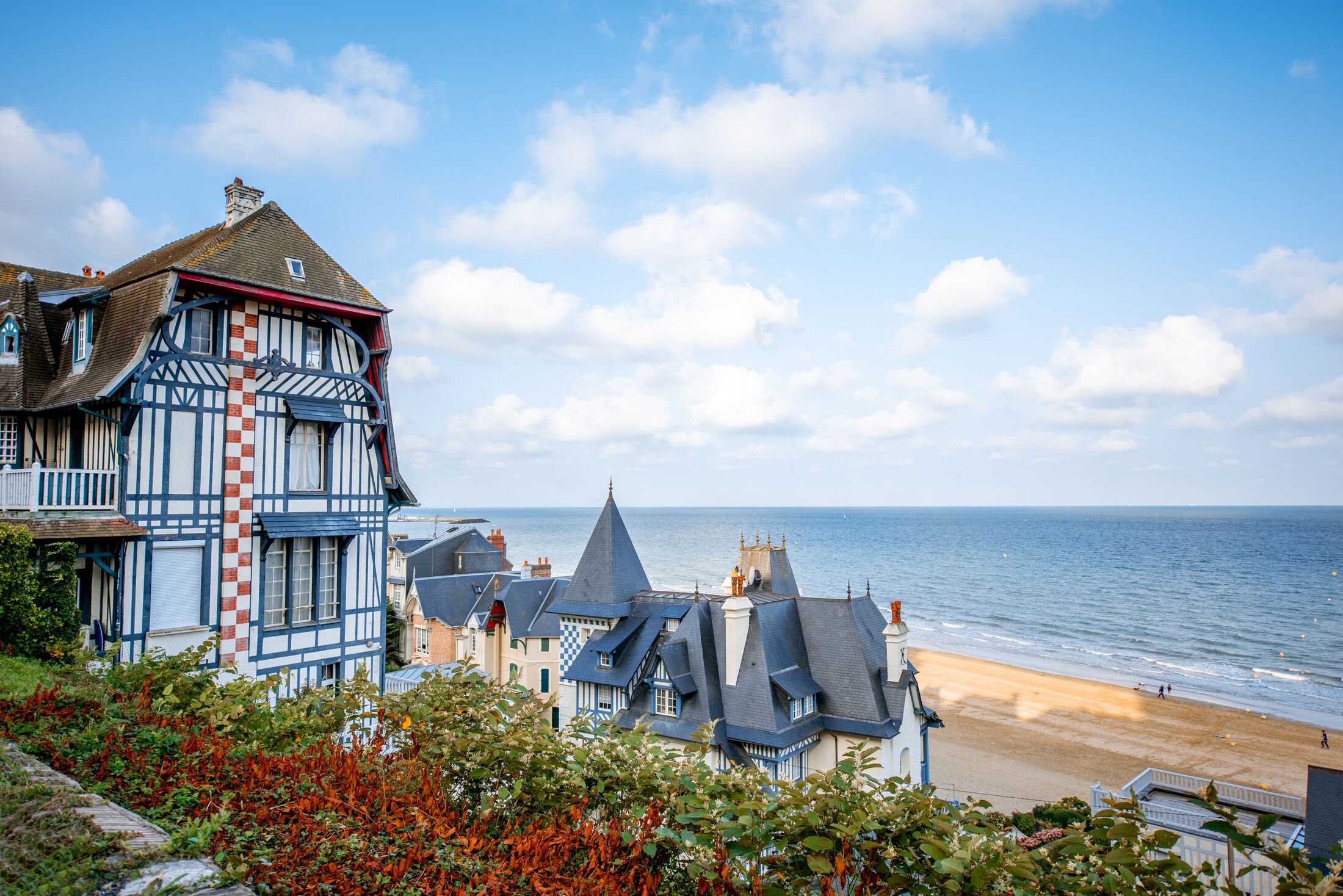 Top view of Trouville city with luxury houses and beautiful beach on the background during the morning light in France